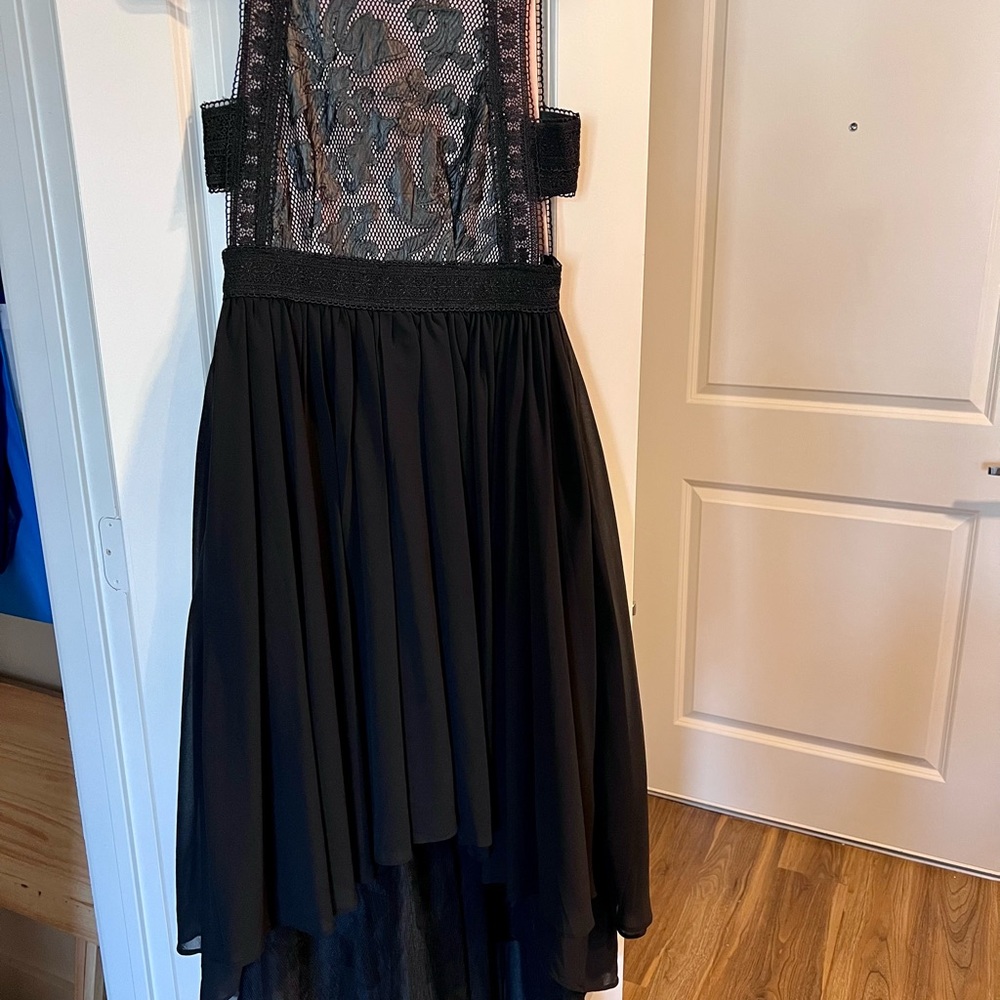 Black hi-low dress with cut out sides